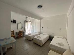 Posteľ alebo postele v izbe v ubytovaní Deep Blue Rooms & Apartments