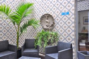 Posezení v ubytování Porto Domus Hotel