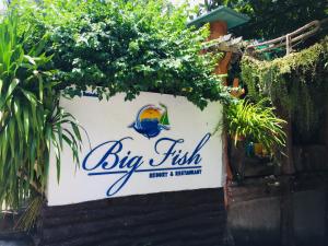 a sign for a big fish event and restaurant at Big Fish Resort Koh Tao in Koh Tao