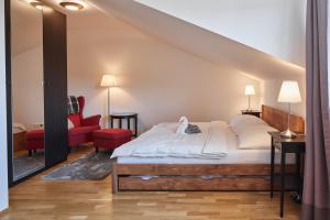 Postel nebo postele na pokoji v ubytování Luční apartmán Tymiána