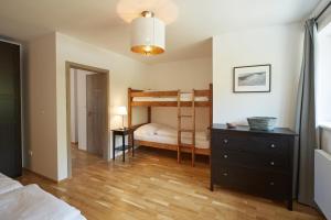 Postel nebo postele na pokoji v ubytování Luční apartmán Tymiána