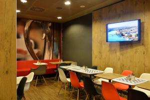 TV a/nebo společenská místnost v ubytování Ibis Budapest City