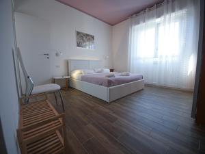 Postel nebo postele na pokoji v ubytování B&b Angolo 29