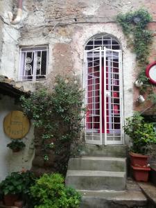 The facade or entrance of MAISONETTE Fata Bislacca, calcata