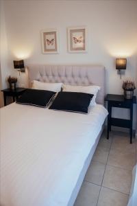 Postel nebo postele na pokoji v ubytování Leto Nuevo Hotel