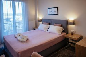 Postel nebo postele na pokoji v ubytování Leto Nuevo Hotel