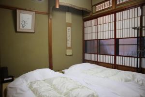 Yoshiki Stay客房内的一张或多张床位