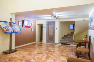 The lobby or reception area at Hotel Marina