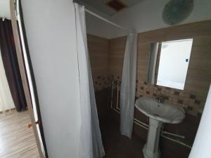 Koupelna v ubytování YANNIS GUEST HOUSE