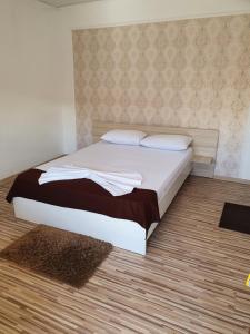 Postel nebo postele na pokoji v ubytování YANNIS GUEST HOUSE