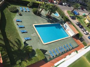 an overhead view of a swimming pool in a yard at Apartment Alcudia Beach in Port d'Alcudia