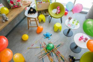 an overhead view of a room with balloons and toys at ibis budget Nice Californie Lenval in Nice