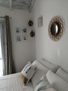 A bed or beds in a room at Oltre le Dune