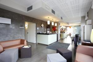 
The lobby or reception area at Hotel Lido
