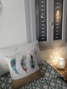 A bed or beds in a room at Oltre le Dune