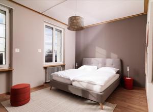 Hotel Bad Murtensee客房内的一张或多张床位