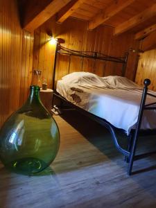 Postel nebo postele na pokoji v ubytování Rustico Lago di Como b&b