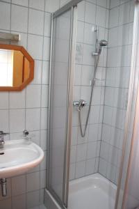 a bathroom with a shower and a sink at Ferienwohnung Bickel in Sankt Anton im Montafon