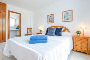 Posteľ alebo postele v izbe v ubytovaní Myhost Augusta Altafulla