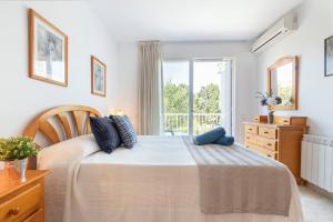 Posteľ alebo postele v izbe v ubytovaní Myhost Augusta Altafulla + 36 fotografií