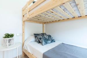 Posteľ alebo postele v izbe v ubytovaní Myhost Augusta Altafulla