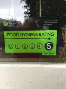 a food hygiene rating sign on a window at The Burnside in Edmondbyers