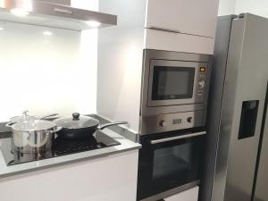 Kuchyň nebo kuchyňský kout v ubytování villa Lorenza
