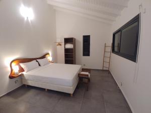 Ein Bett oder Betten in einem Zimmer der Unterkunft villa Lorenza