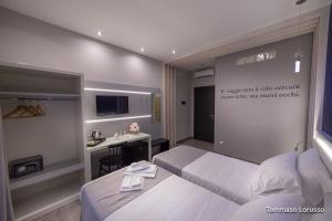 A bed or beds in a room at HOLYGOLD Suite ****