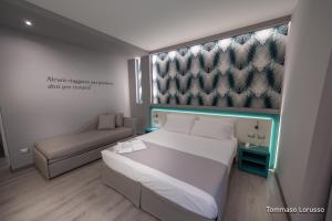 A bed or beds in a room at HOLYGOLD Suite ****