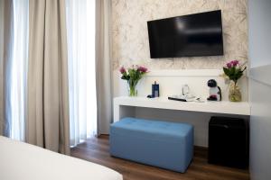 TV a/nebo společenská místnost v ubytování Hotel Palace