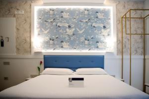 Postel nebo postele na pokoji v ubytování Hotel Palace