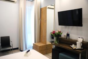 TV a/nebo společenská místnost v ubytování Hotel Palace