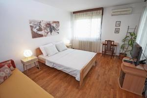 Postel nebo postele na pokoji v ubytování Apartment Nena