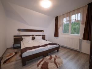 Postel nebo postele na pokoji v ubytování Cabana Edelweiss