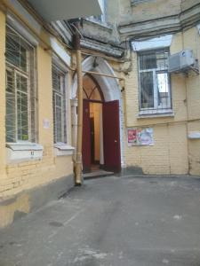 an entrance to a building with a red door at Future in Kyiv