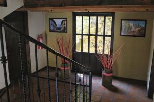 TV a/nebo společenská místnost v ubytování Spa Holistico Real Hotel