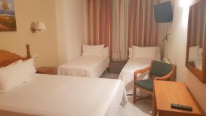 Cama o camas de una habitación en Hotel Turmo