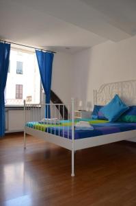 Postel nebo postele na pokoji v ubytování B&B Archi di Borgolungo