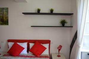 Postel nebo postele na pokoji v ubytování B&B Archi di Borgolungo