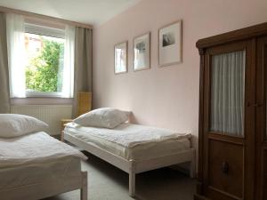 Postel nebo postele na pokoji v ubytování Ferienwohnung Erfurt