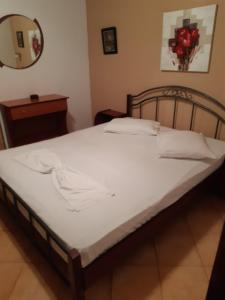 Postel nebo postele na pokoji v ubytování Dora sarti