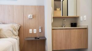 Vonios kambarys apgyvendinimo įstaigoje studio novo na Vila Madalena