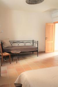 Postel nebo postele na pokoji v ubytování B&B LaLibellula