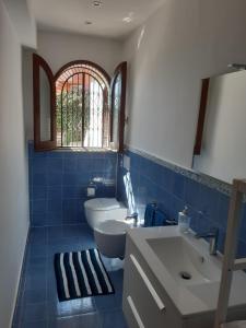 A bathroom at Charming Place Taormina
