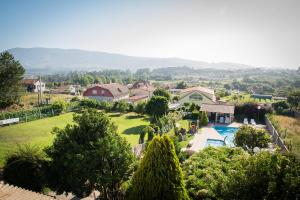 A view of the pool at Hotel A Queimada or nearby