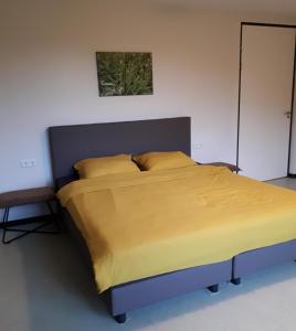 Postel nebo postele na pokoji v ubytování B&B In de Wei