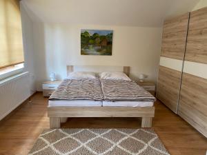 Postel nebo postele na pokoji v ubytování Aqua
