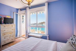 Posteľ alebo postele v izbe v ubytovaní Apartamento EL CABO V