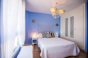 Posteľ alebo postele v izbe v ubytovaní Apartamento EL CABO V